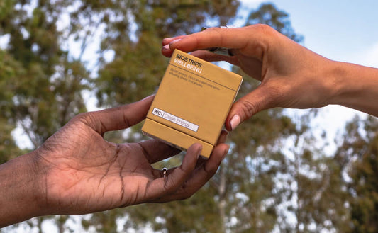 An appealing display of BIOSTRIPS™ Clean Energy packets, emphasizing the sleek packaging with the product name and logo, complementing the theme of the blog about sustainable, crash-free energy boosts.