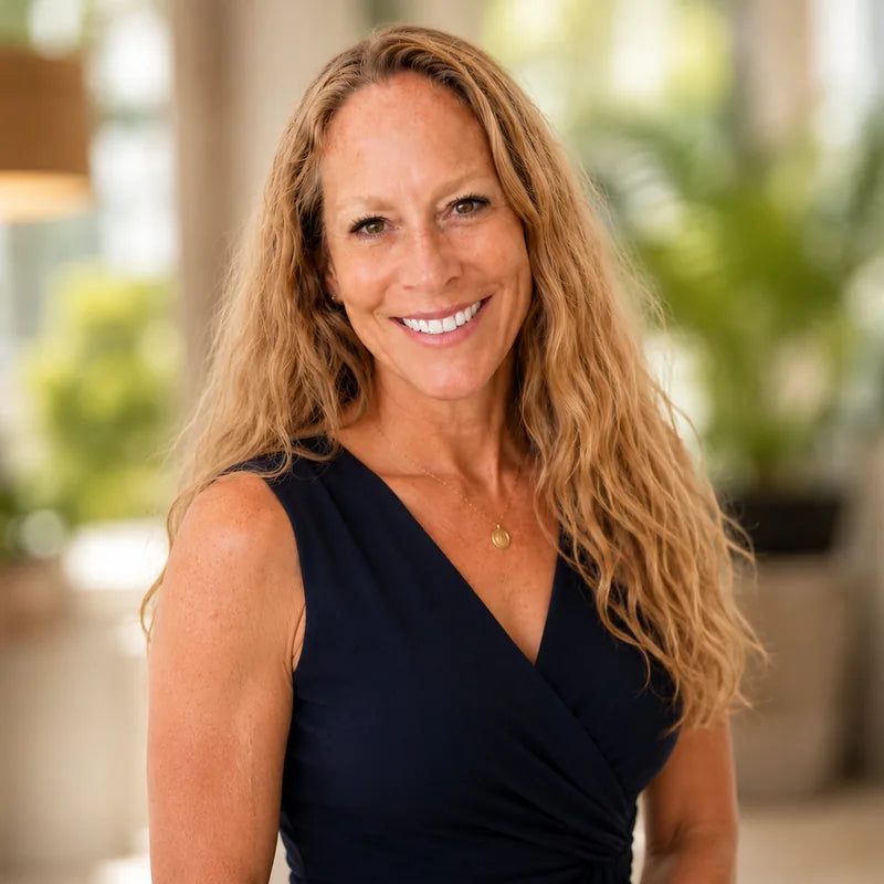 Portrait of Dr. Stoler, smiling, in a naturally lit interior